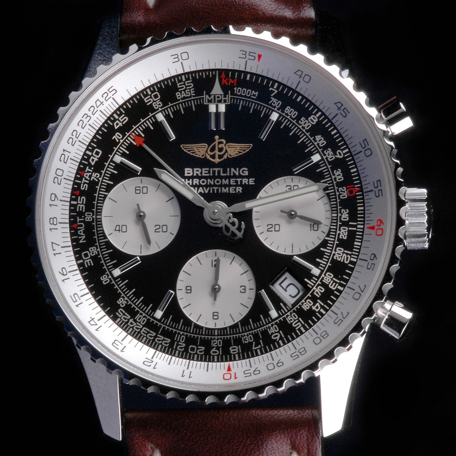 Quadrante di un Breitling Navitimer con regolo calcolatore e tre contatori
