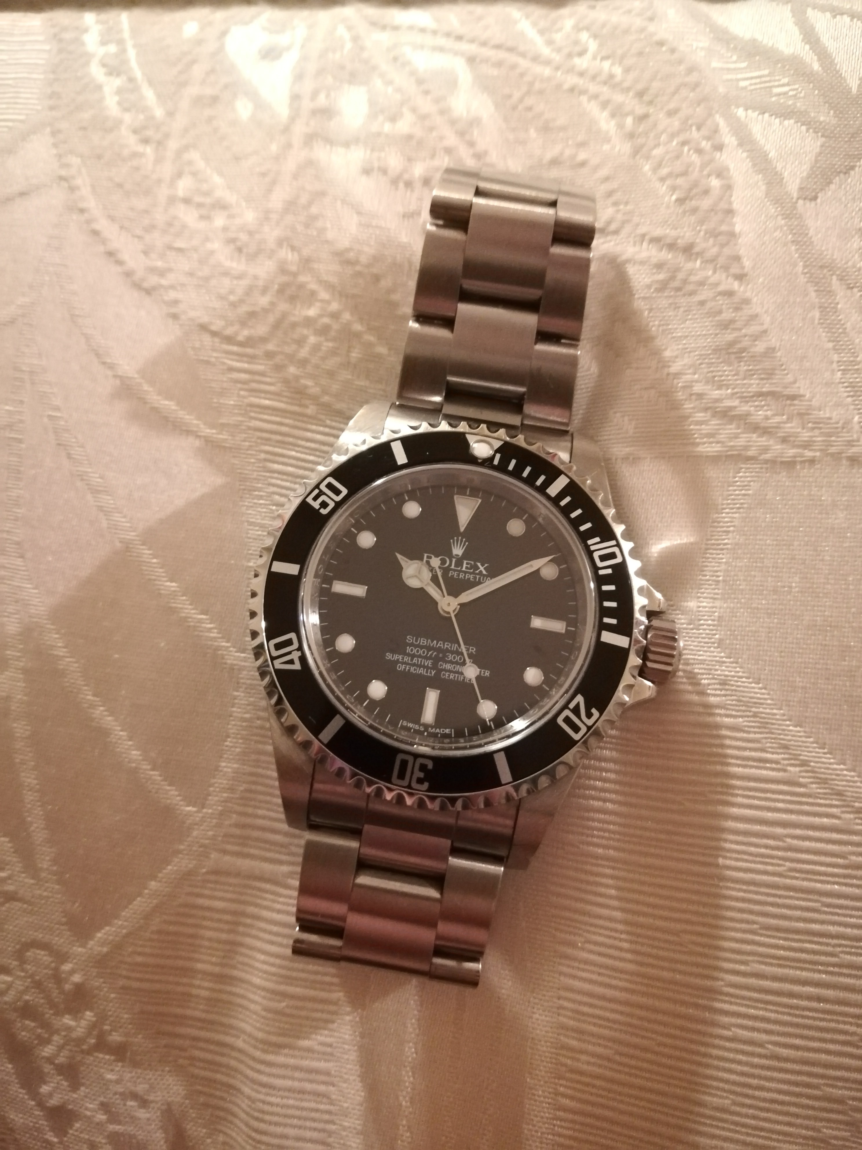 Rolex Submariner 14060M in acciaio con quadrante nero e lunetta nera